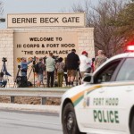 Reporters gather outside one of the entrances to Fort Hood military base near Killeen, Texas. Spc. Ivan Lopez killed three fellow soldiers there before committing suicide Wednesday.(Photo: ASHLEY LANDIS, EPA)